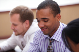 A male co-op student smiling